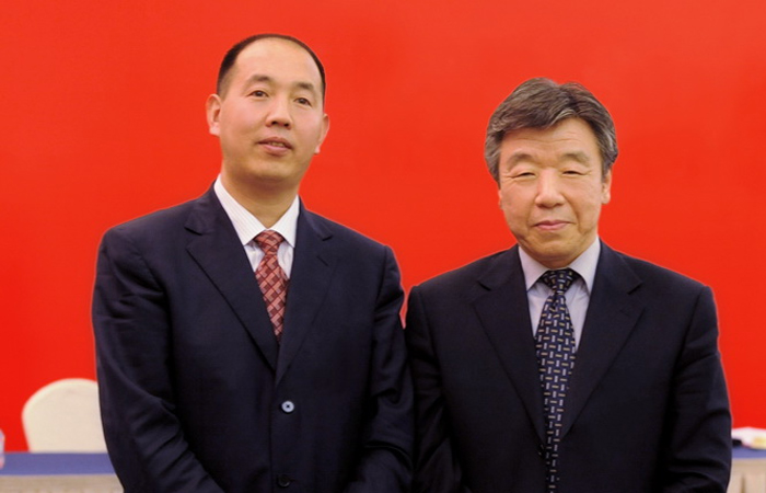 原全國政協副主席任盧展工和張全收董事長合影